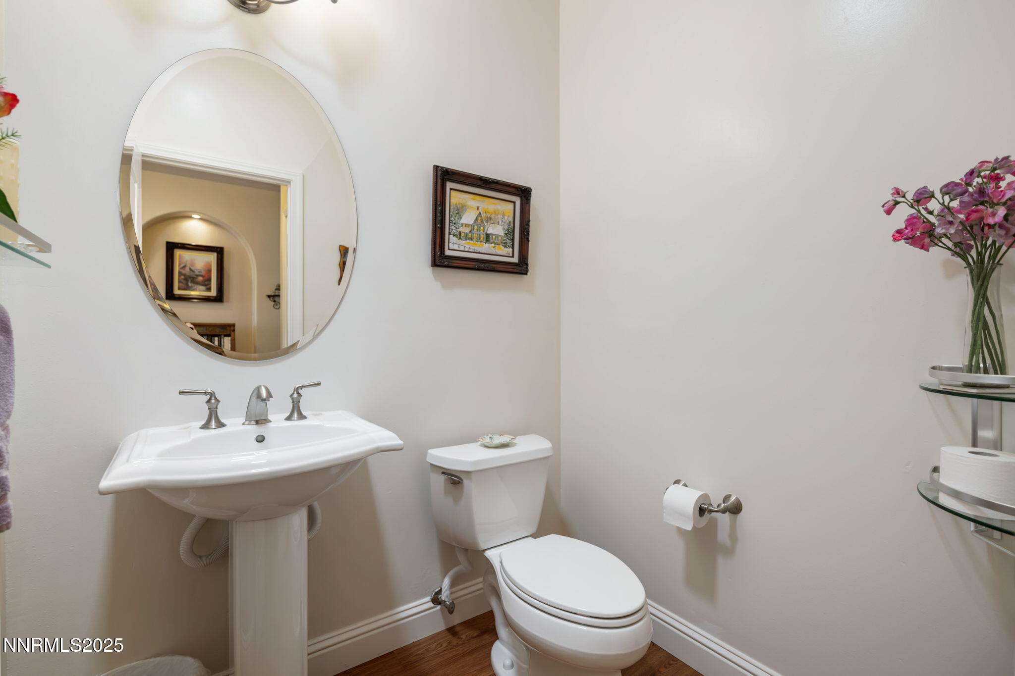 112 Eagle Brook Lane Dayton, NV 89403 - Photo 17 of 48 a bathroom with a toilet sink and mirror