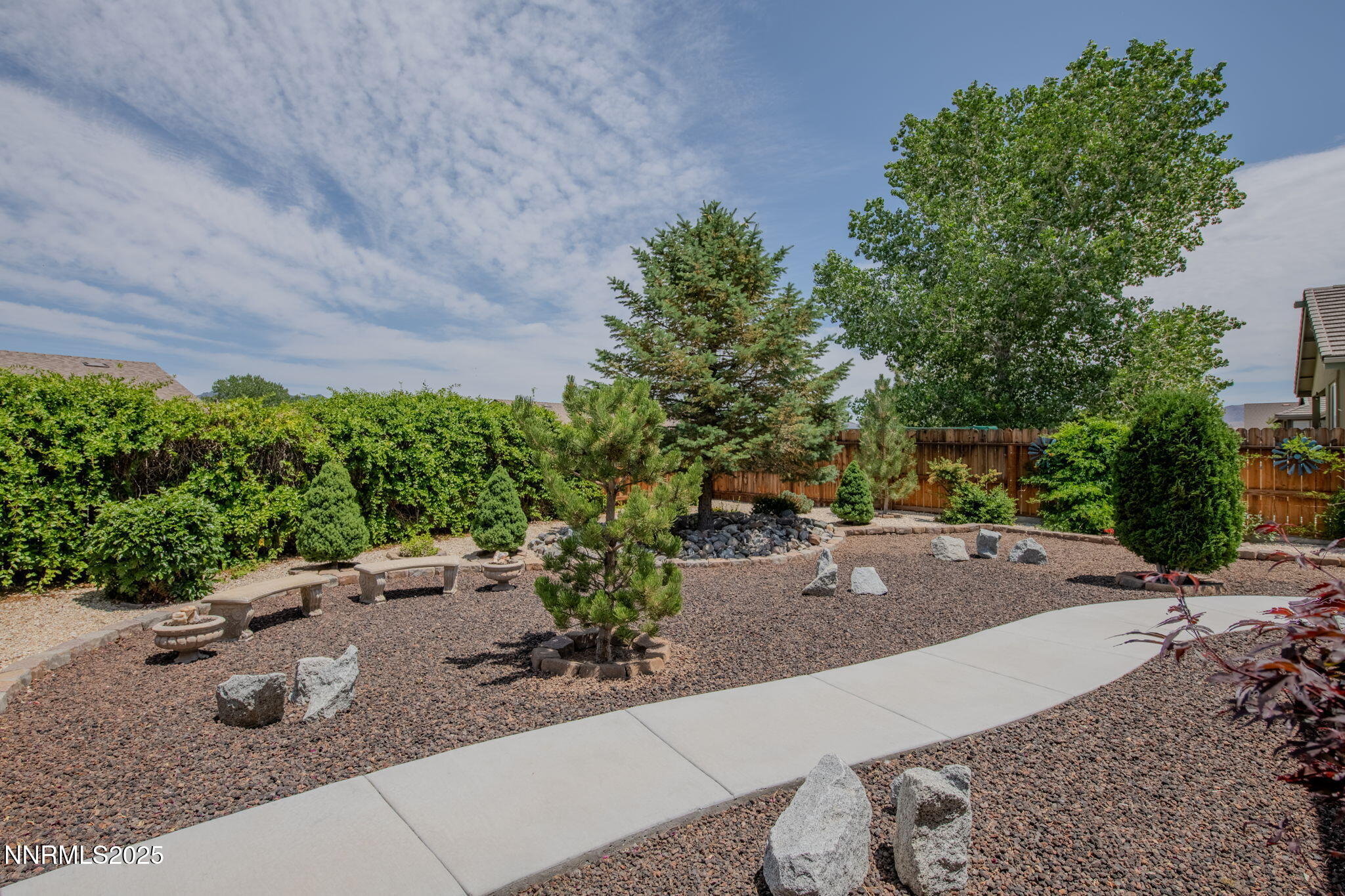 112 Eagle Brook Lane Dayton, NV 89403 - Photo 45 of 48 a view of a garden with potted plants