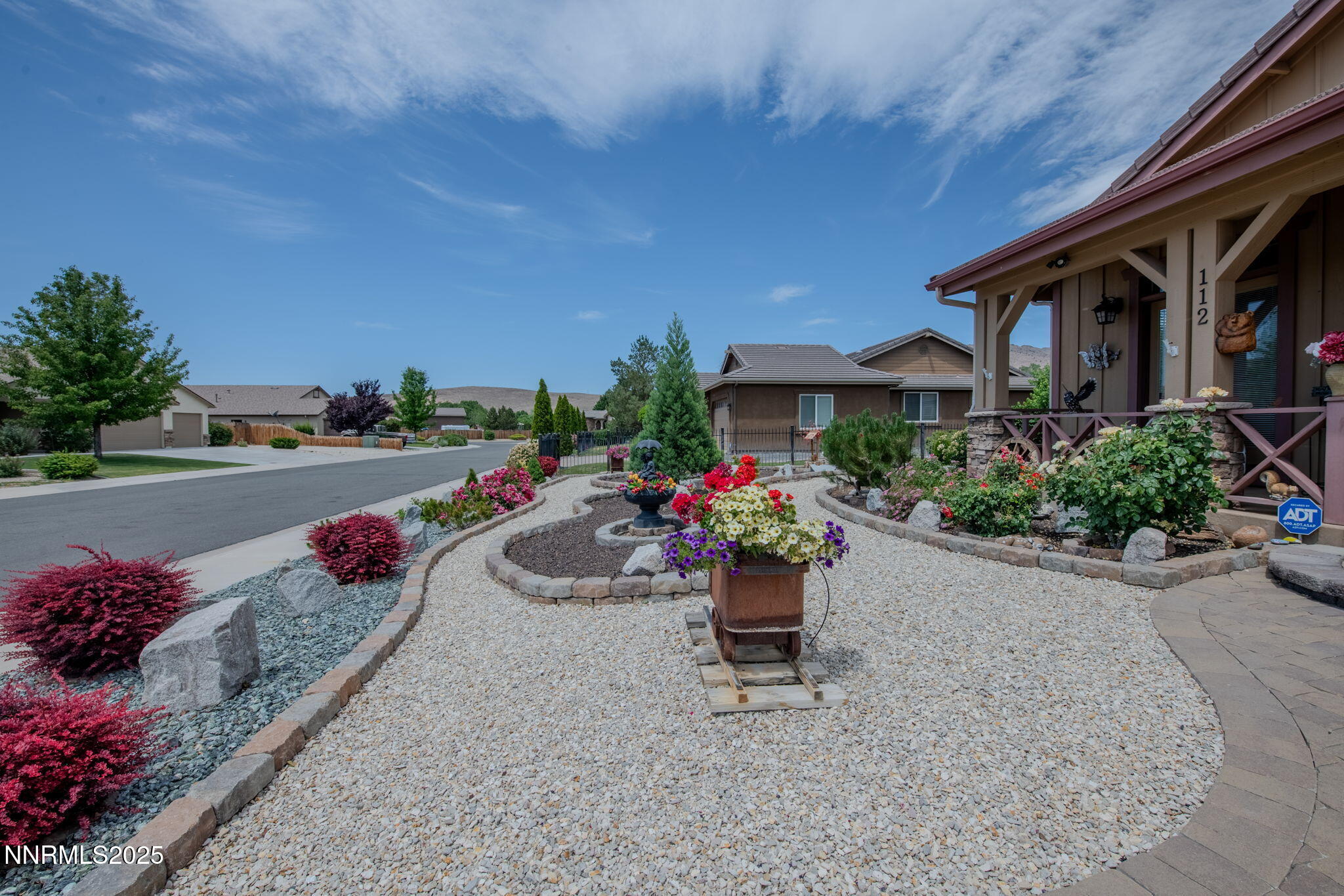112 Eagle Brook Lane Dayton, NV 89403 - Photo 9 of 48 a garden view with a seating space