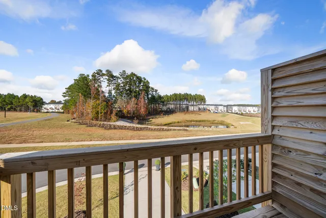 a view of kitchen with furniture and wooden floor