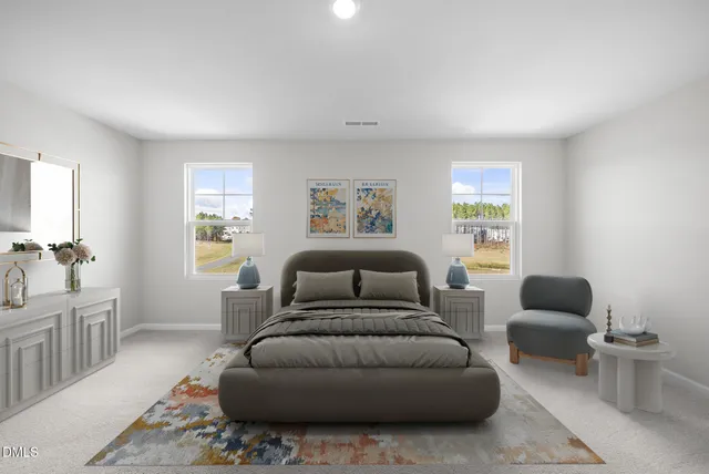 a bedroom with furniture and a couch