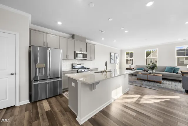 a swimming pool with outdoor seating and yard