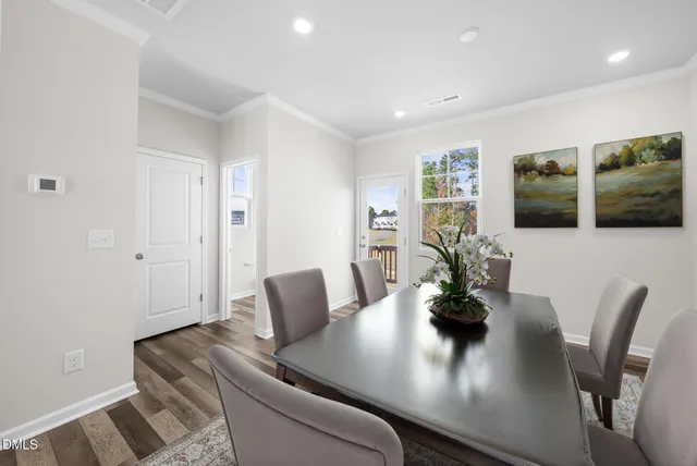 a kitchen with a sink and a refrigerator