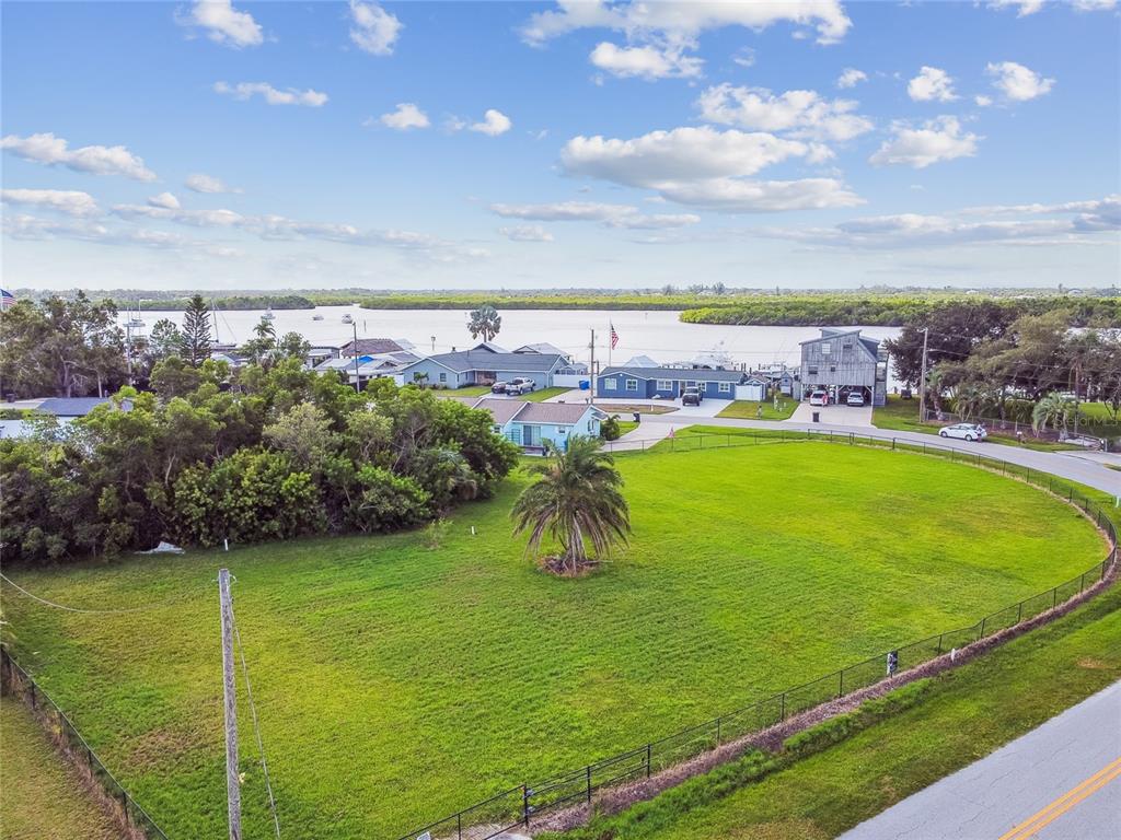 West Shell Point Road Ruskin, FL 33570 - Photo 6 of 23 a view of a lake with a big yard