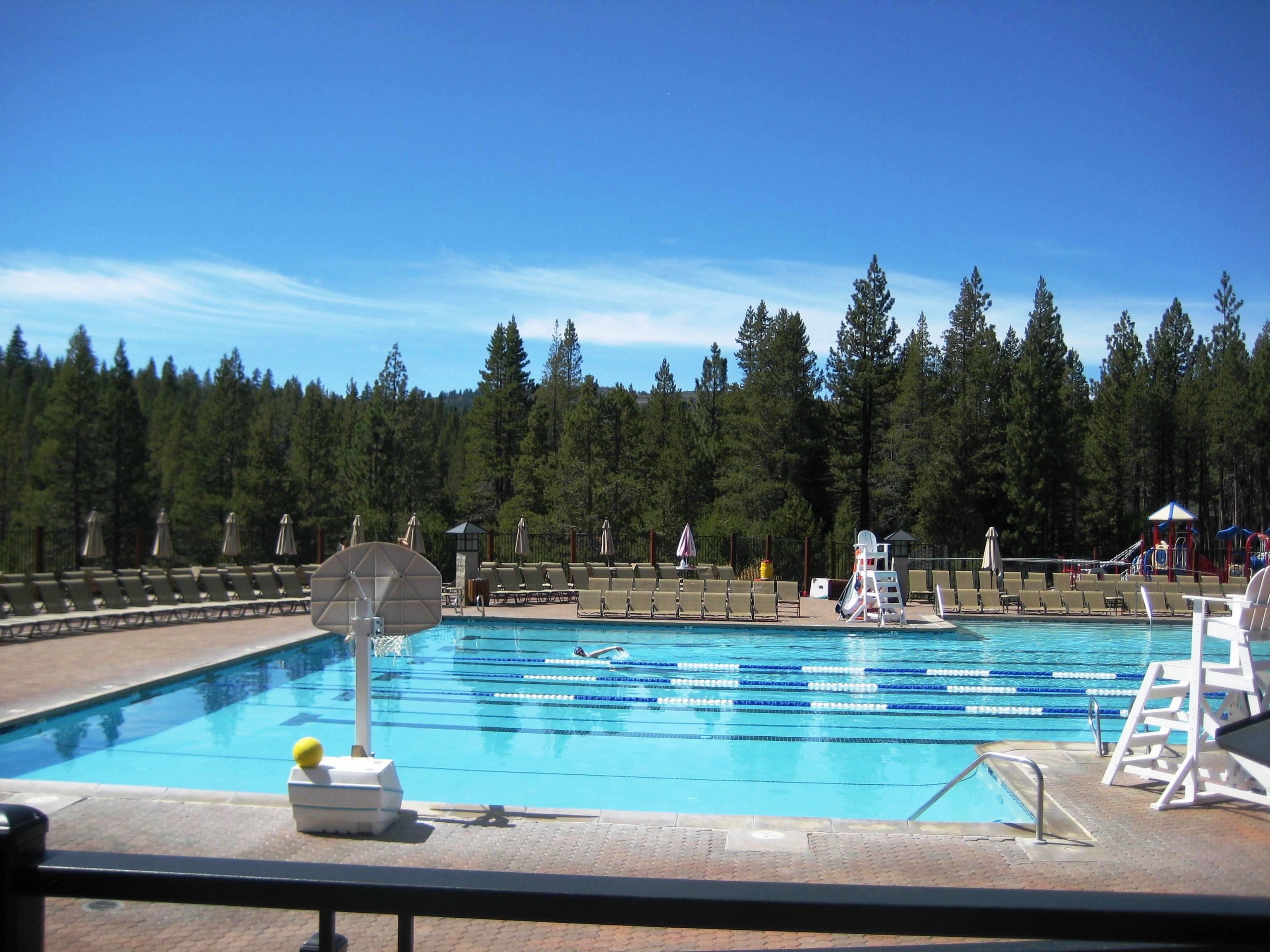13456 Ski View Loop Truckee, CA 96161 - Photo 23 of 24 a view of a swimming pool with a bench