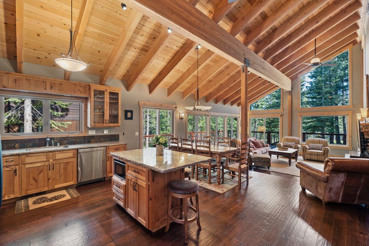 13456 Ski View Loop Truckee, CA 96161 - Photo 5 of 24 a large room with wooden furniture and large windows