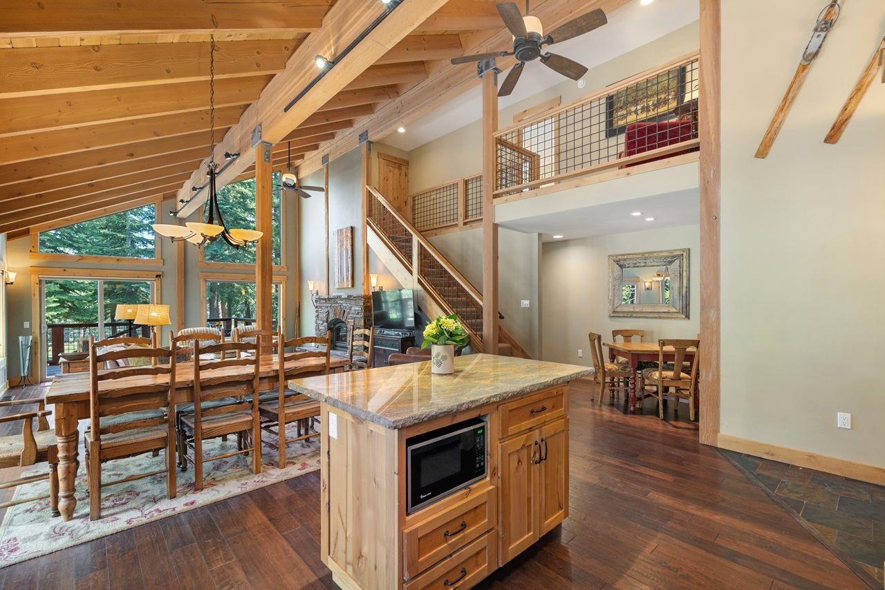13456 Ski View Loop Truckee, CA 96161 - Photo 6 of 24 a kitchen with stainless steel appliances granite countertop a stove and a wooden floors