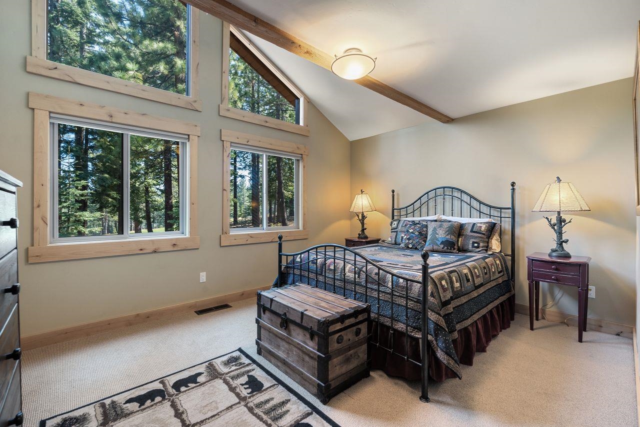 13456 Ski View Loop Truckee, CA 96161 - Photo 10 of 24 a bedroom with a bed wooden floor and window