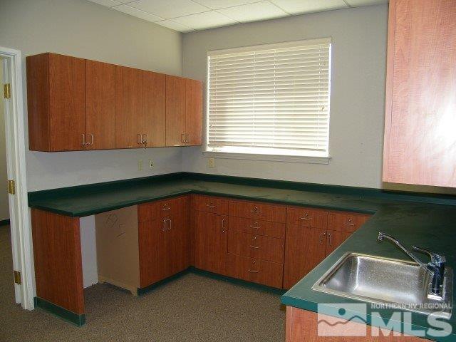 5 Pine Cone Road, Unit 107 Dayton, NV 89403 - Photo 12 of 14 a room with window and cabinet
