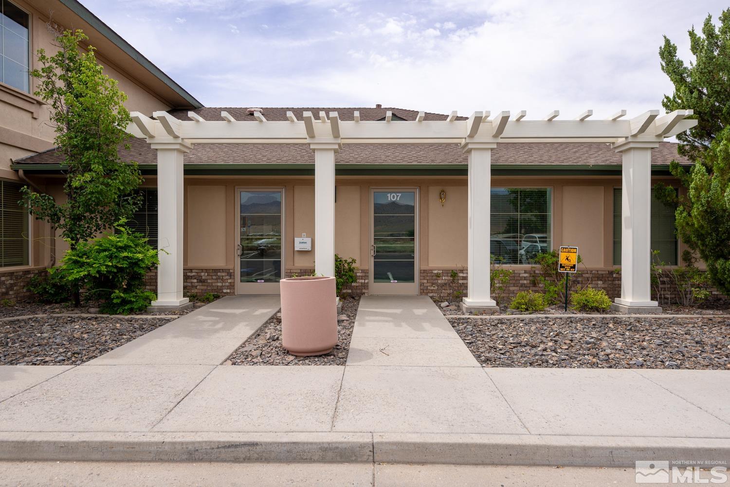 5 Pine Cone Road, Unit 107 Dayton, NV 89403 - Photo 6 of 14 a front view of a house with porch