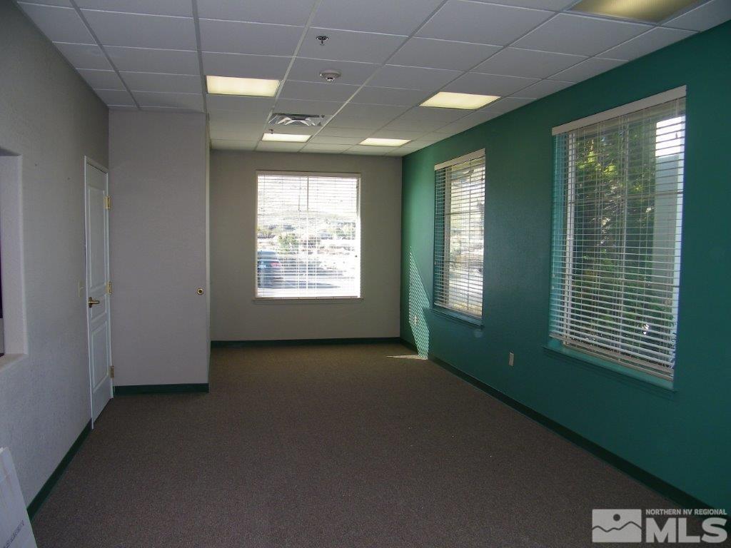 5 Pine Cone Road, Unit 107 Dayton, NV 89403 - Photo 8 of 14 an empty room with windows