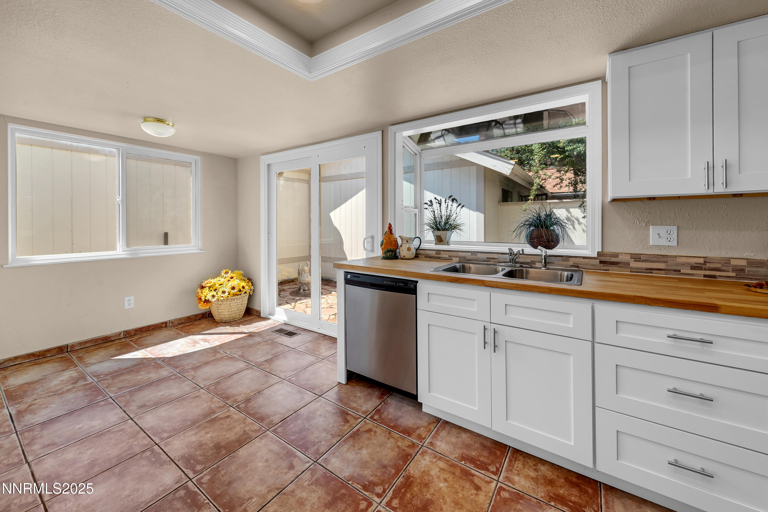 1265 Searchlite Court Reno, NV 89503 - Photo 14 of 43 a kitchen with sink and cabinets