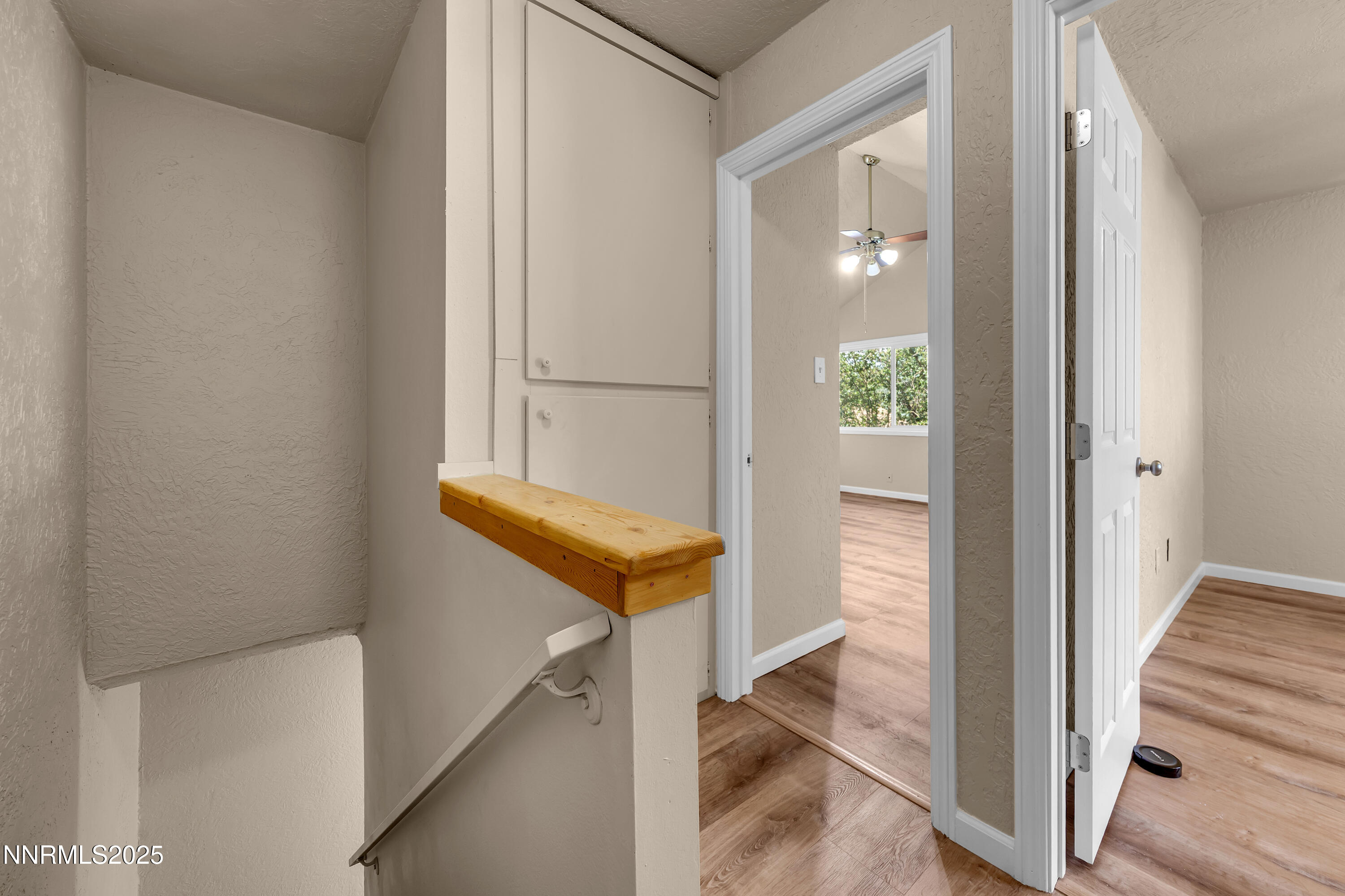 1265 Searchlite Court Reno, NV 89503 - Photo 25 of 43 a view of a hallway with wooden floor and entryway