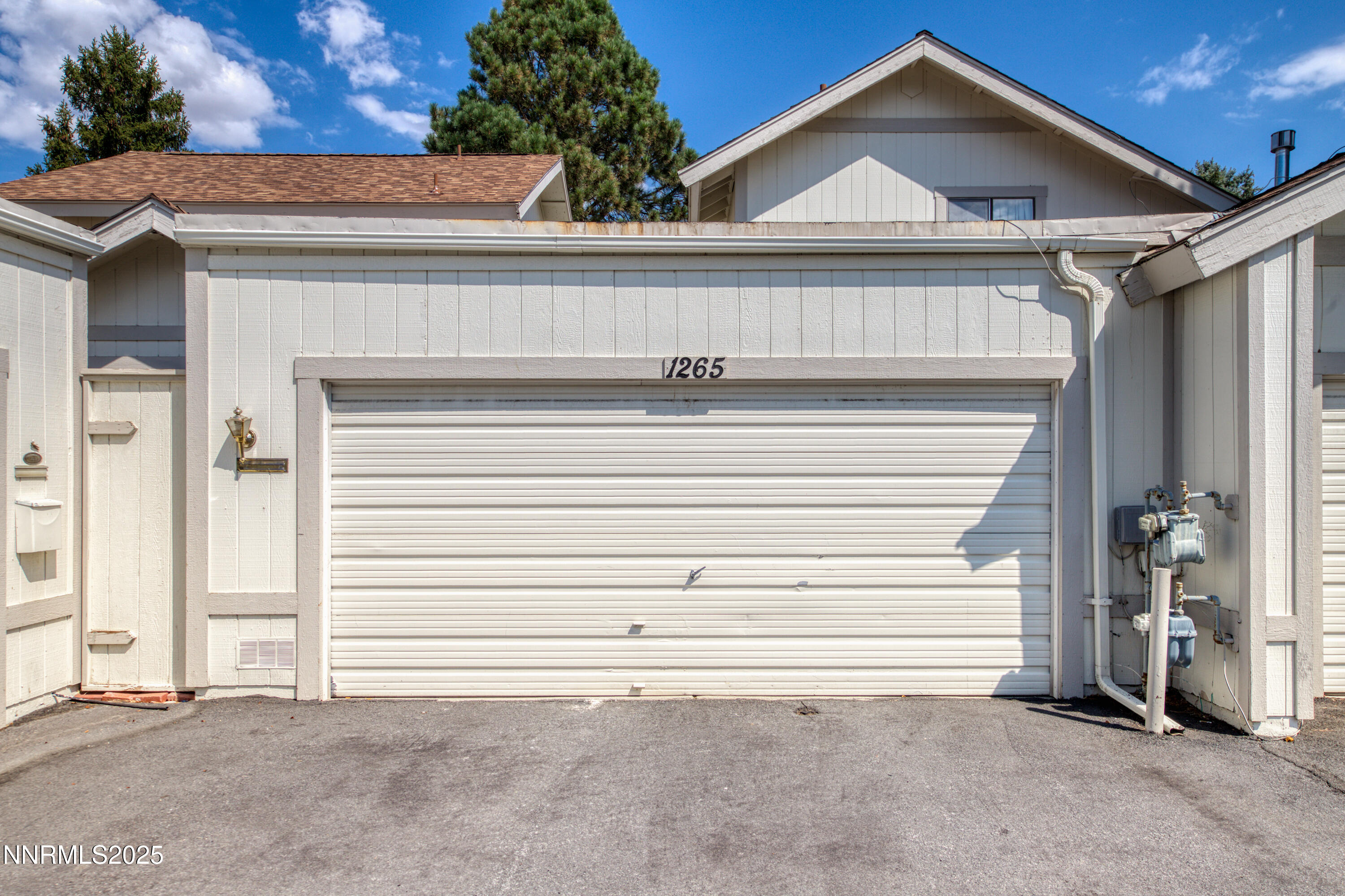 1265 Searchlite Court Reno, NV 89503 - Photo 38 of 43 a view of a house with a garage