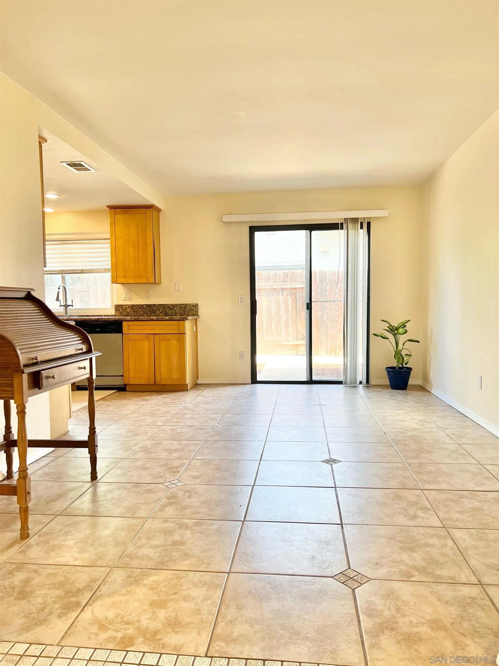 9212 Lake Hill Road Santee, CA 92071 - Photo 12 of 42 a view of an empty room with a window