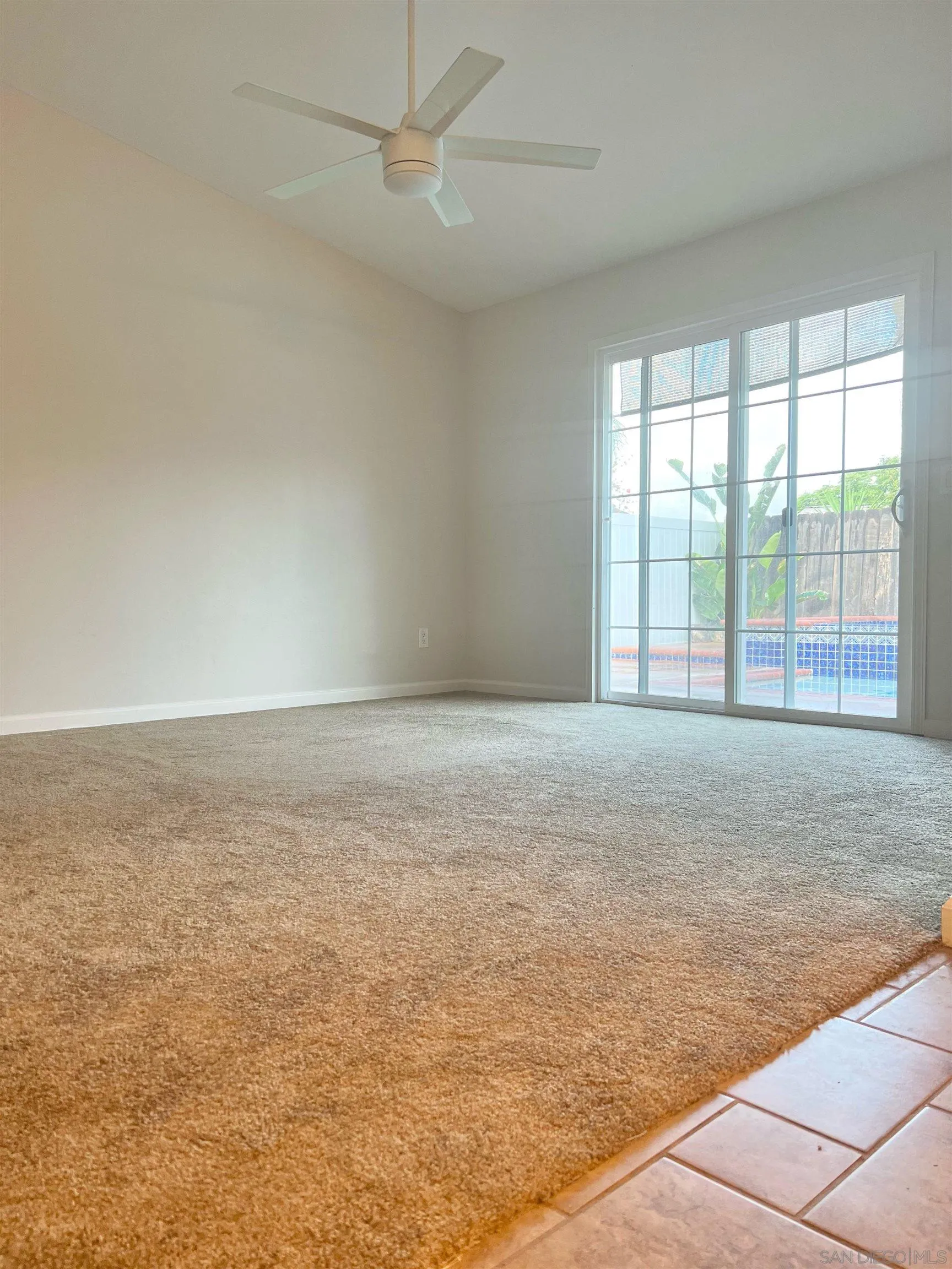 9212 Lake Hill Road Santee, CA 92071 - Photo 16 of 42 a view of an empty room with a window