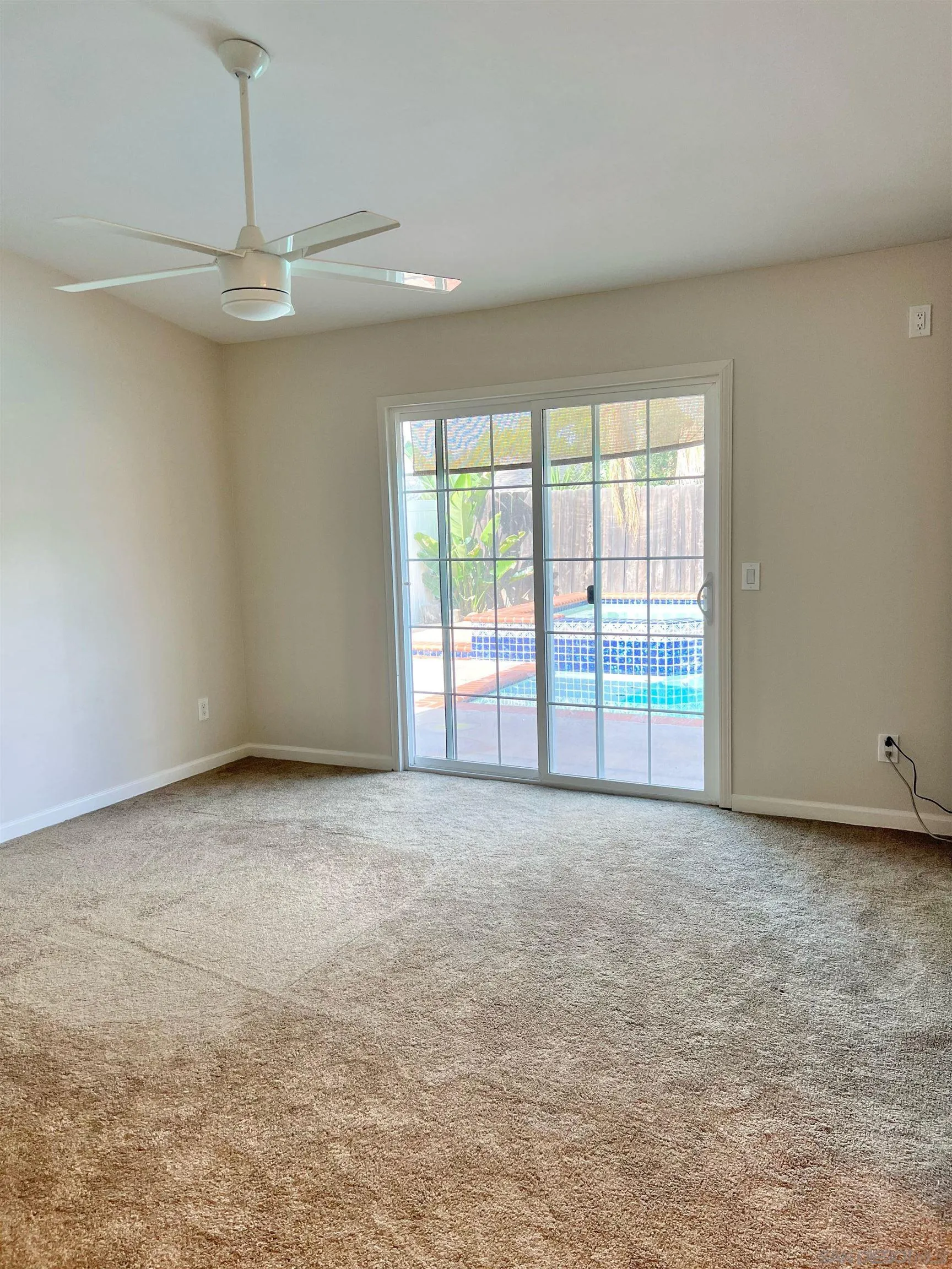 9212 Lake Hill Road Santee, CA 92071 - Photo 17 of 42 a view of an empty room with a window