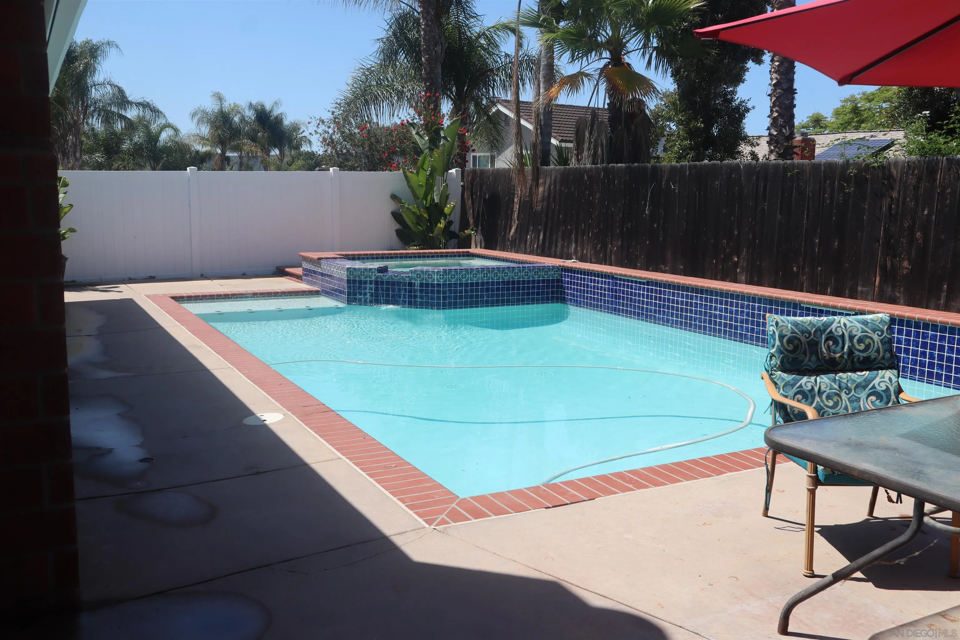 9212 Lake Hill Road Santee, CA 92071 - Photo 37 of 42 a view of a chairs and table in patio