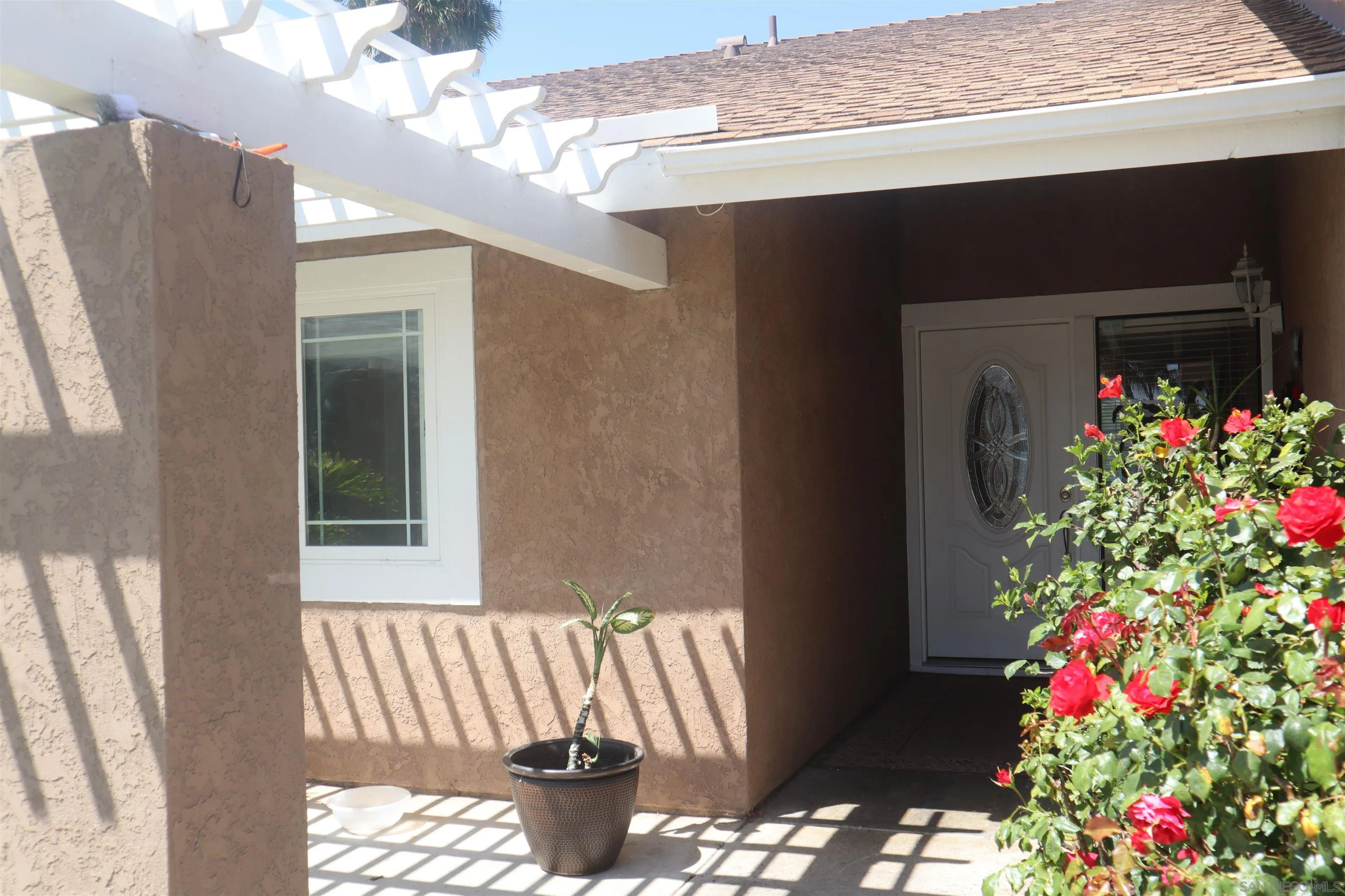 9212 Lake Hill Road Santee, CA 92071 - Photo 4 of 42 a front view of a house