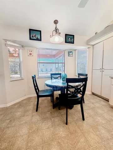 a view of a dining room with furniture