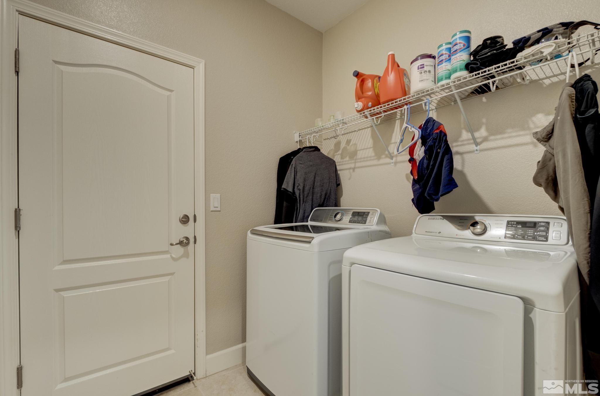 10180 Culiacan Pass Trail Reno, NV 89521 - Photo 25 of 34 a utility room with dryer and washer