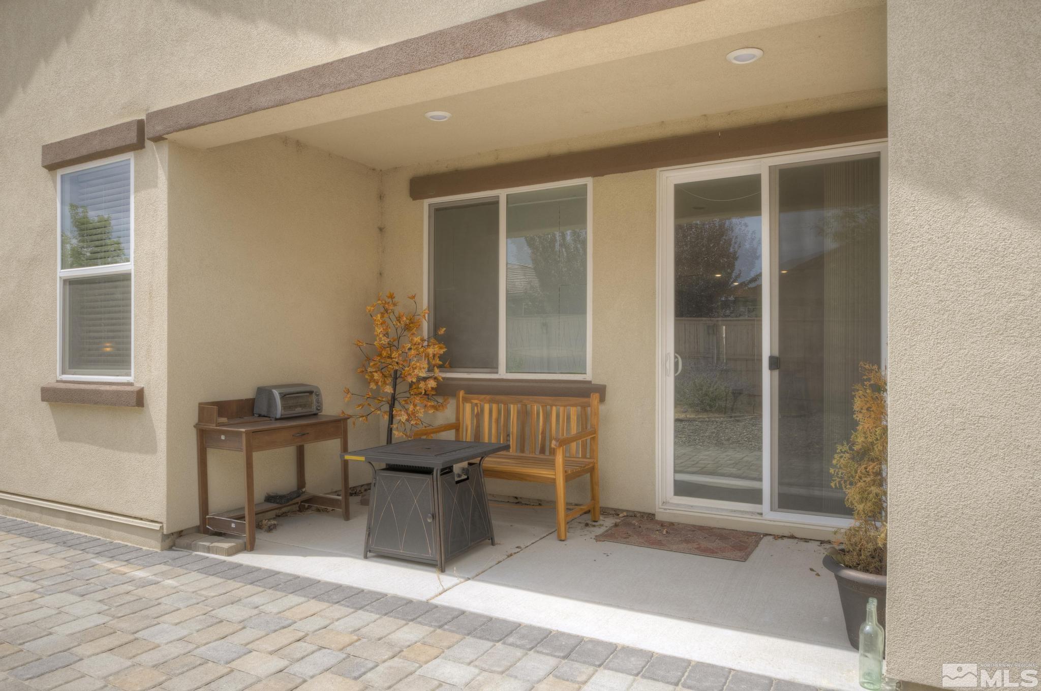 10180 Culiacan Pass Trail Reno, NV 89521 - Photo 33 of 34 a view of a livingroom with furniture and windows