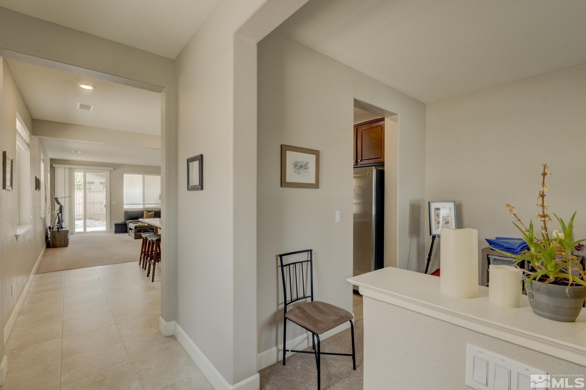 10180 Culiacan Pass Trail Reno, NV 89521 - Photo 4 of 34 a view of a living room and dining room
