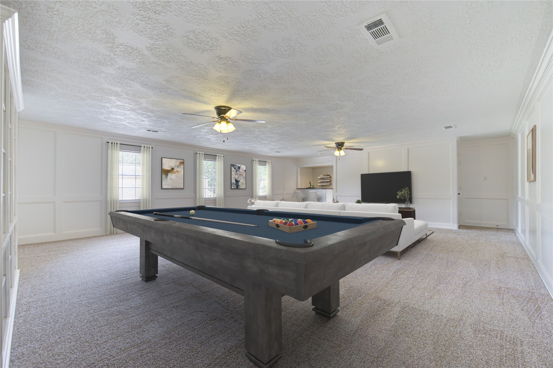 9115 Taidswood Drive Spring, TX 77379 - Photo 35 of 45 Here is another view of this unbelievably big gameroom. It is a perfect place for the kids to play, or let your imagination go wild and convert it into a mother-in-law suite with a kitchen and bath. It is a bonus you don't see in other homes! There is also a secondary staircase leading down to the garage, making it perfect for a private entry.