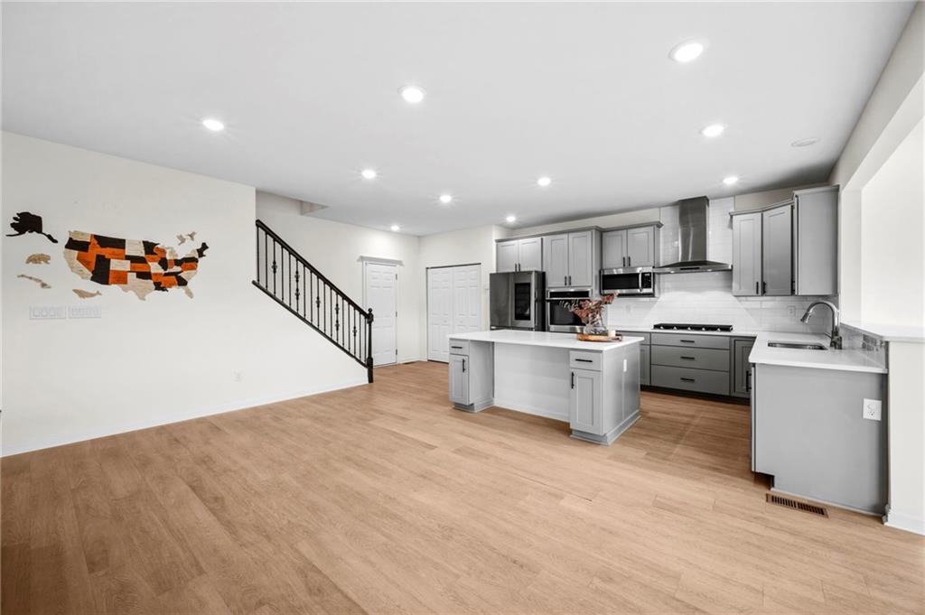 269 Lily Ridge Drive Canonsburg, PA 15317 - Photo 12 of 48 a kitchen with white cabinets and white appliances