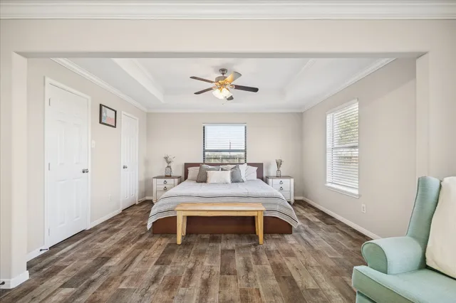 a bed room with a bed and a window