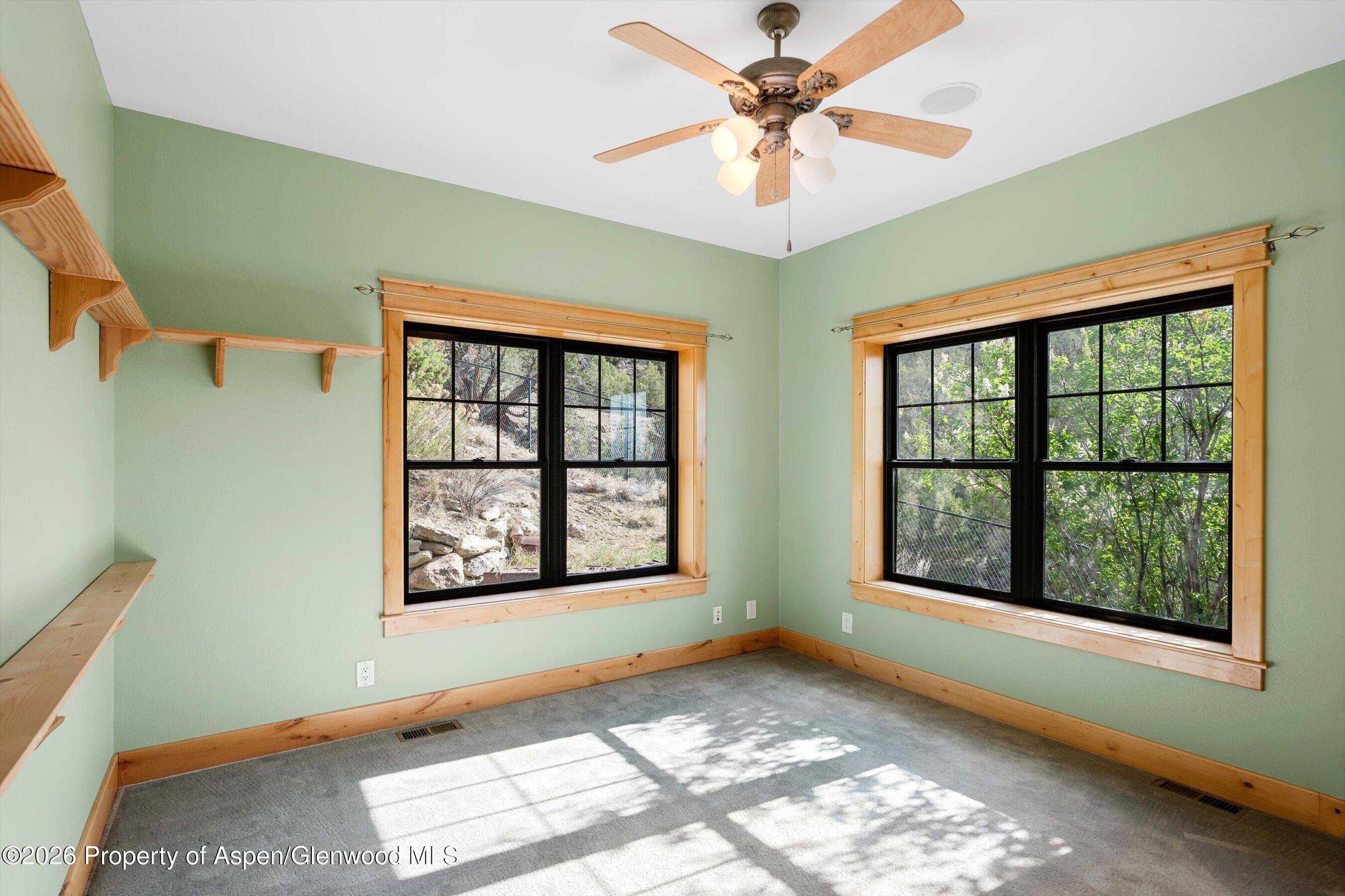 450 Summer Falls Road Silt, CO 81652 - Photo 19 of 50 a view of an empty room with a window