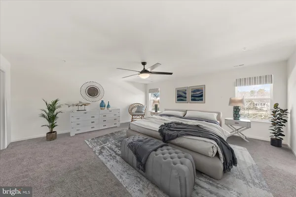 a view of a big room with wooden floor closet and windows