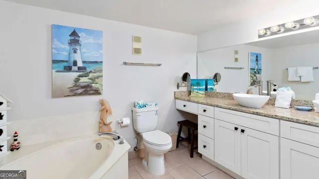 a living room with furniture a couch and a window