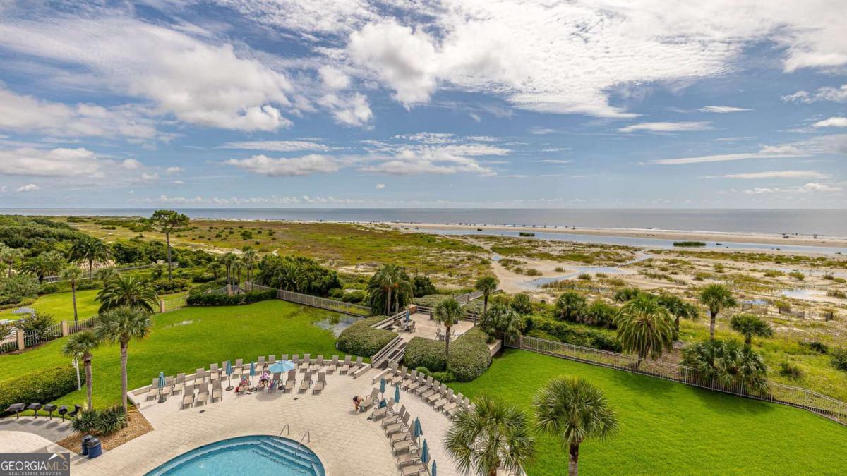 1440 Ocean Boulevard, Unit 224 St. Simons, GA 31522 - Photo 14 of 26 a view of an ocean and beach