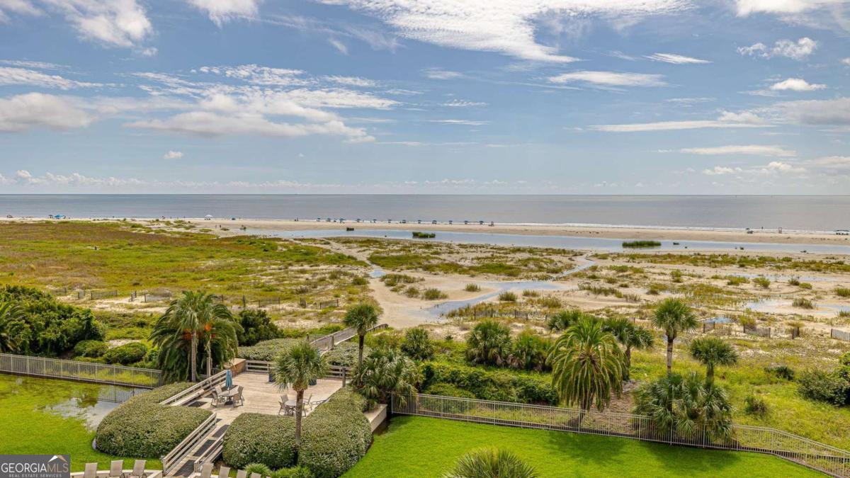 1440 Ocean Boulevard, Unit 224 St. Simons, GA 31522 - Photo 15 of 26 a view of an ocean and beach