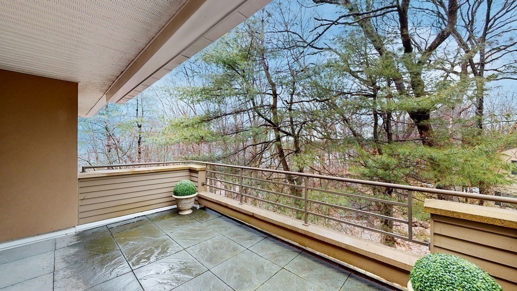 206 Allandale Road, Unit 2D Boston, MA 02467 - Photo 14 of 39 a view of a terrace with sky view