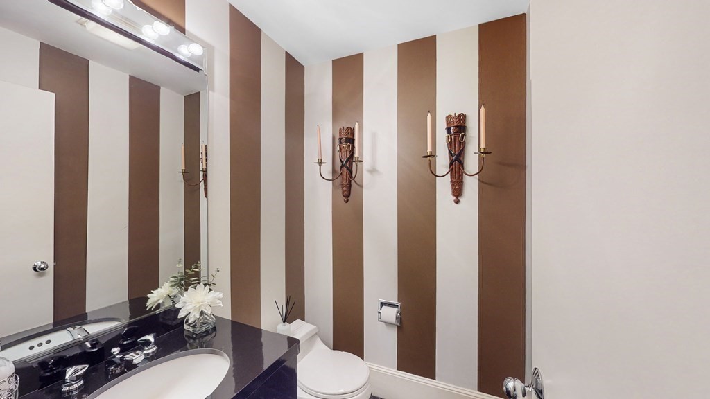 206 Allandale Road, Unit 2D Boston, MA 02467 - Photo 21 of 39 a bathroom with a sink toilet and shower