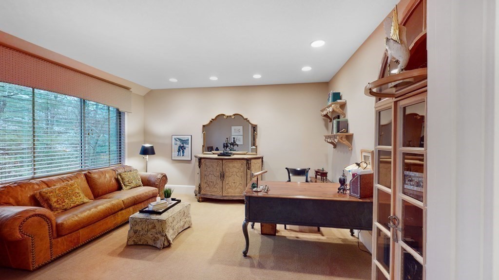 206 Allandale Road, Unit 2D Boston, MA 02467 - Photo 26 of 39 a living room with furniture a rug and a window
