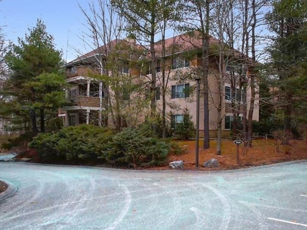 206 Allandale Road, Unit 2D Boston, MA 02467 - Photo 3 of 39 a view of a house with basketball court