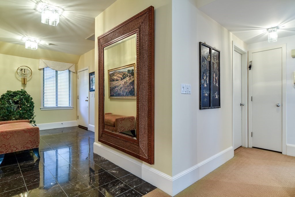 206 Allandale Road, Unit 2D Boston, MA 02467 - Photo 8 of 39 a view of livingroom with furniture and window