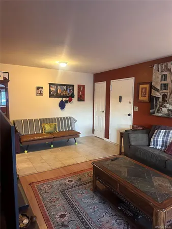 a living room with a couch and a table