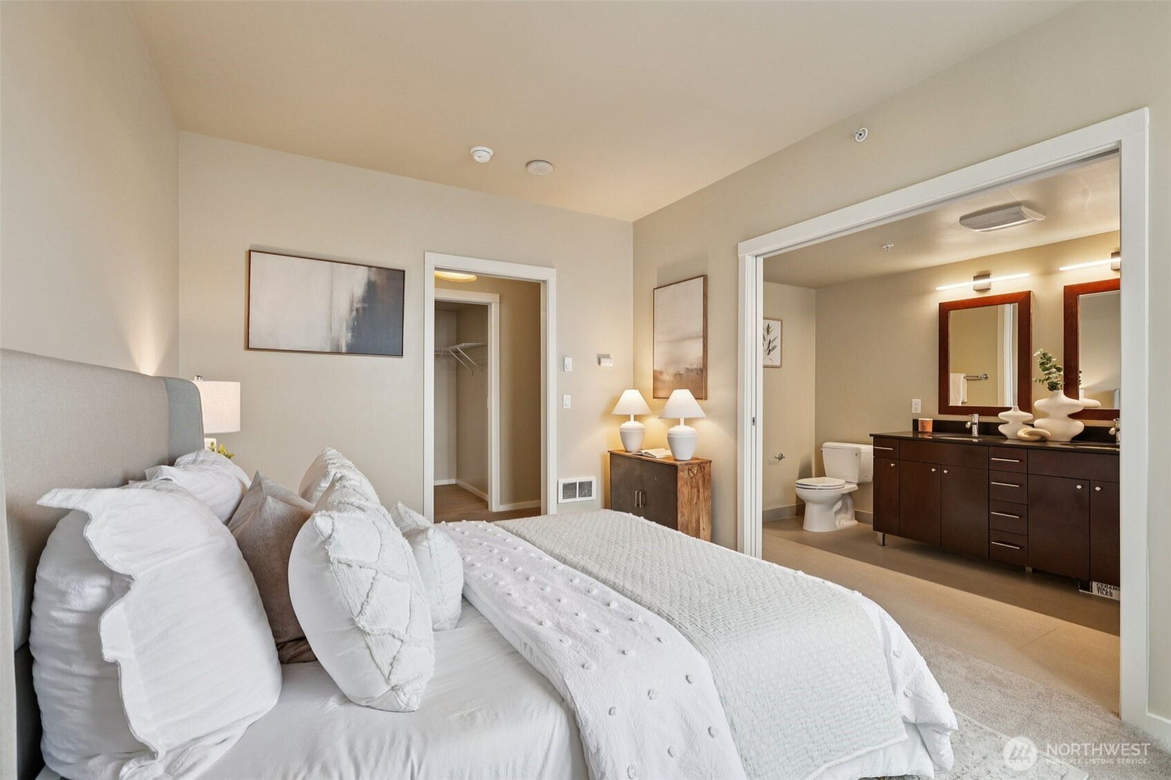 76 Cedar Street, Unit S1005 Seattle, WA 98121 - Photo 11 of 30 a bedroom with a bed and mirror with window