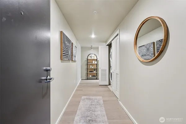 a view of a hallway with front door