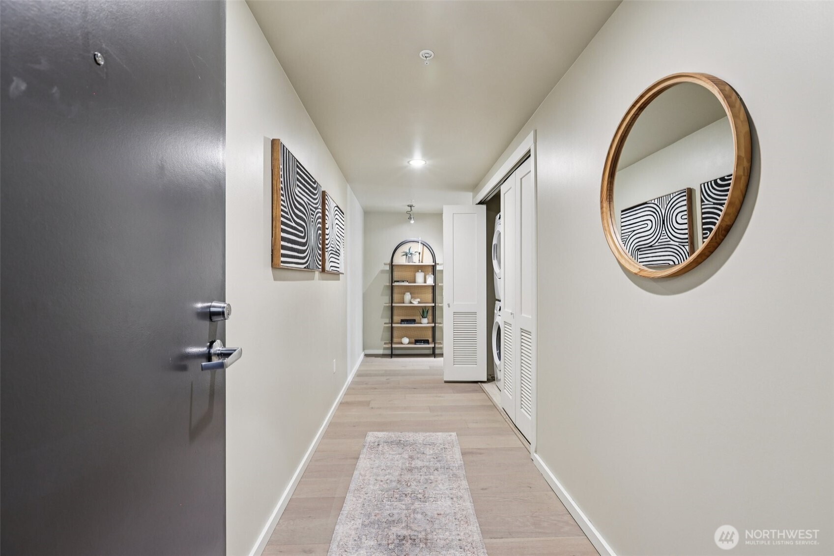 76 Cedar Street, Unit S1005 Seattle, WA 98121 - Photo 16 of 30 a view of a hallway with front door