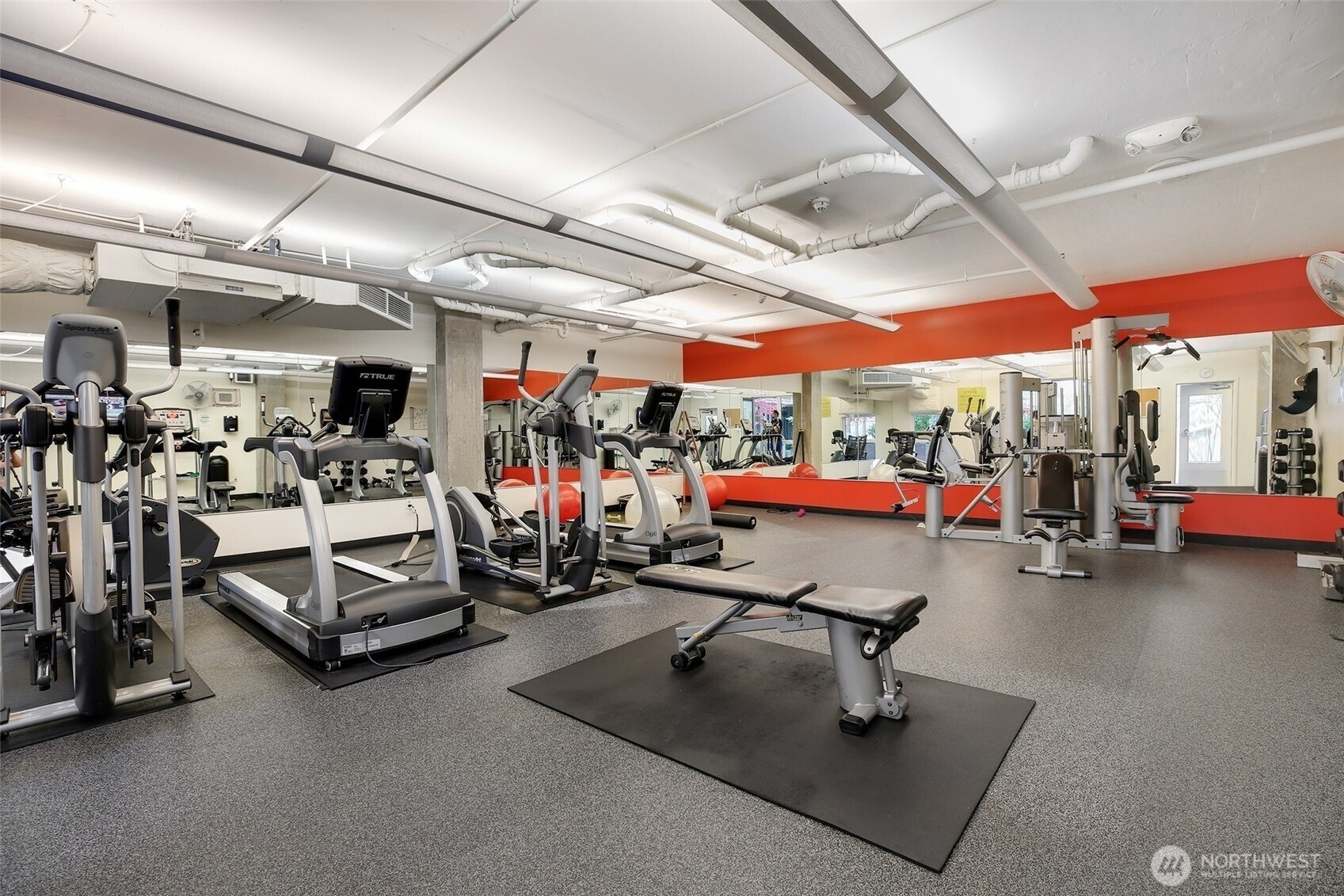 76 Cedar Street, Unit S1005 Seattle, WA 98121 - Photo 18 of 30 a view of a room with gym equipment
