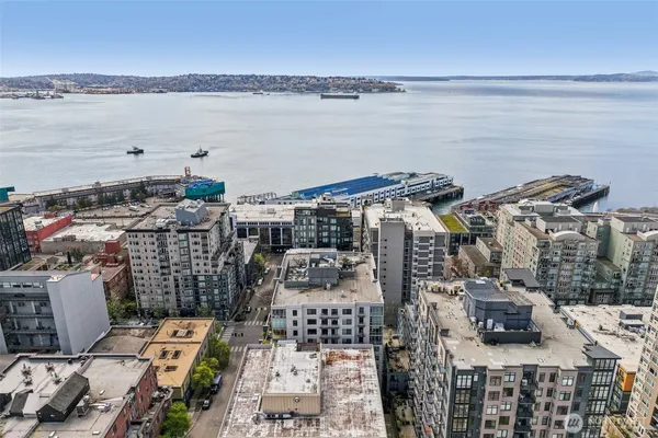 a view of city with ocean