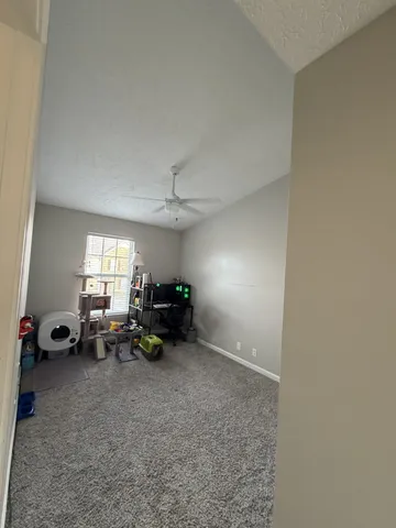 a view of wooden floor and chandelier in a room