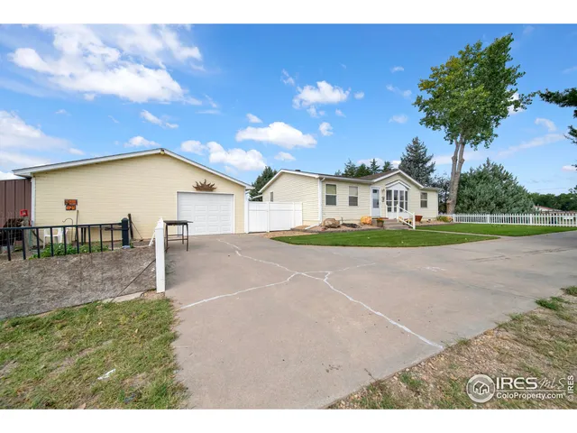 a view of an house with backyard and outdoor space