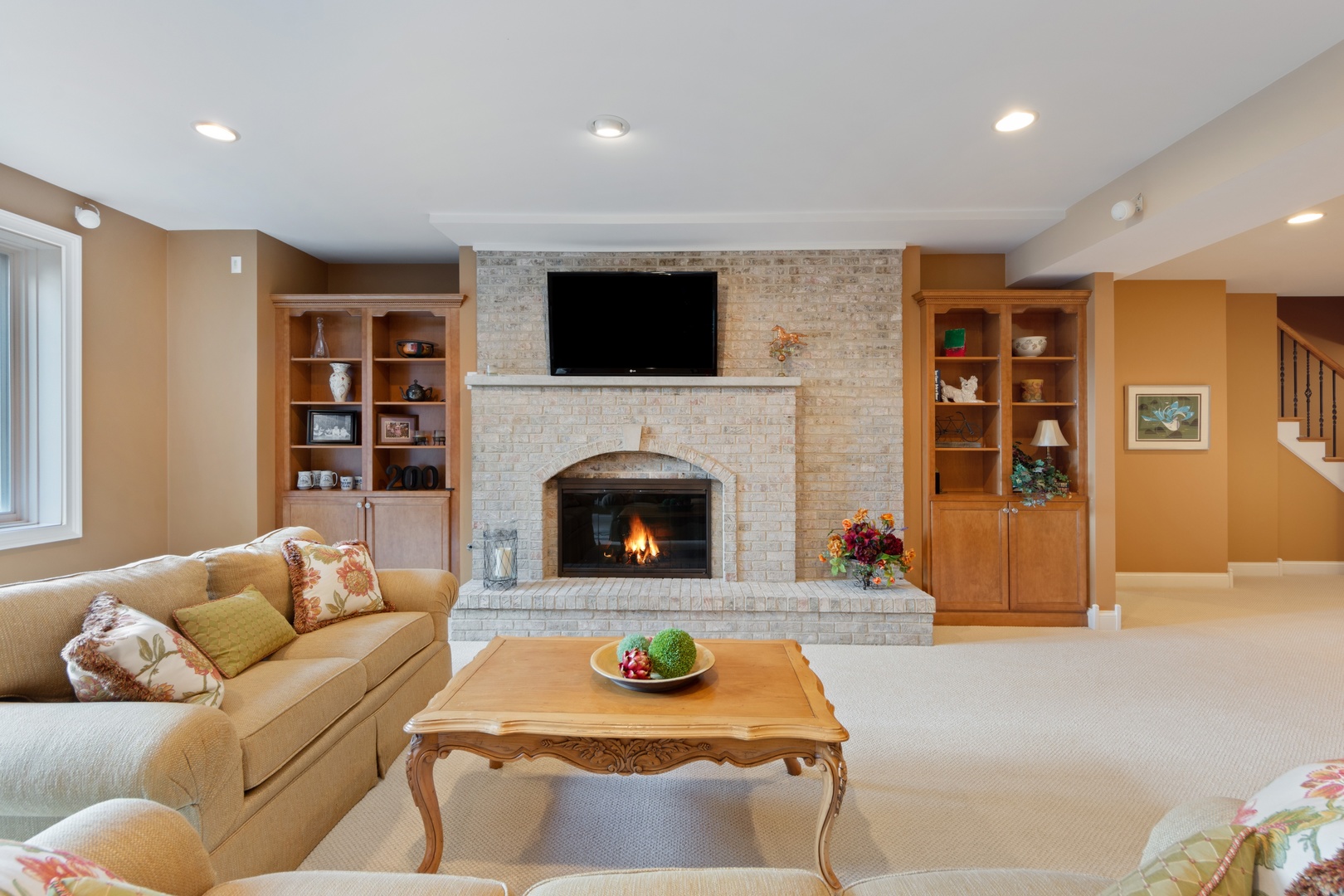 14 Riderwood Road North Barrington, IL 60010 - Photo 22 of 29 a living room with furniture and a fireplace