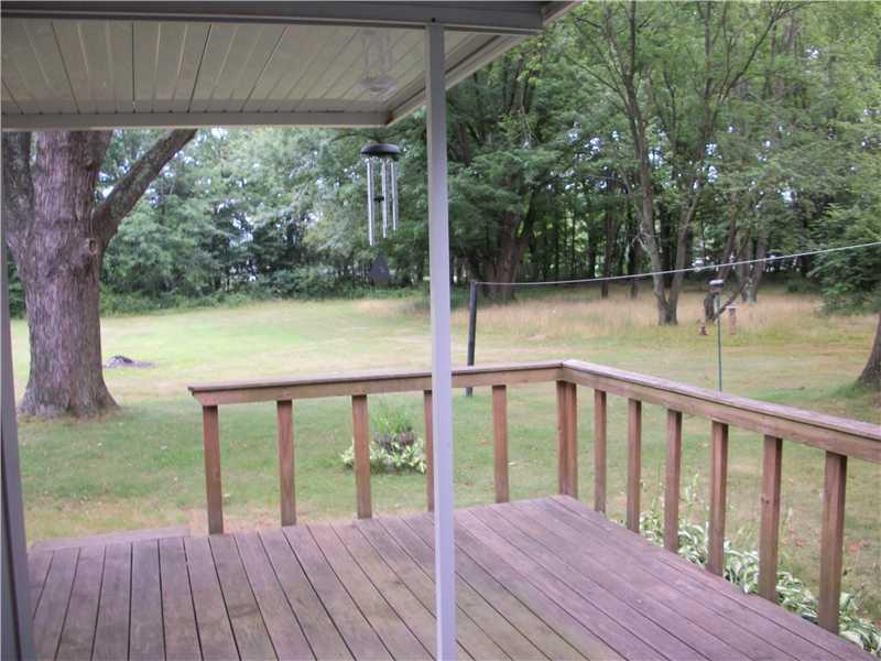 413 Meadow Mist Road Pulaski, PA 16143 - Photo 17 of 17 Exterior Back. Deck in back of the house with awning.
